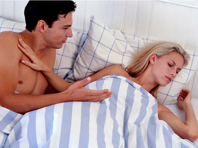 Мужчина и женщина в постели